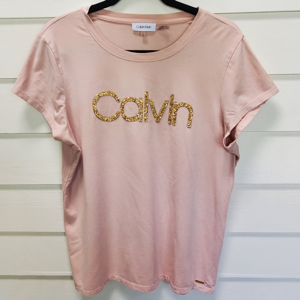 Calvin Klein tee Color: Pink Nude Size L